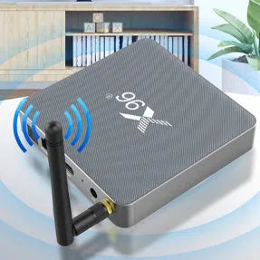Smart voice set-top box with remote control, HDMI cable, and power adapter on a table