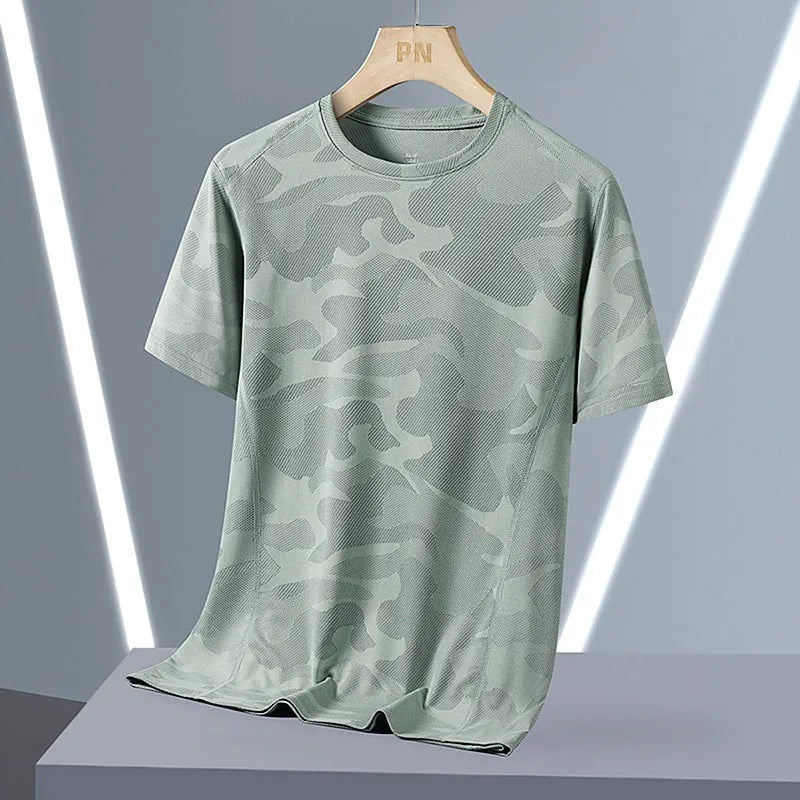 Men's loose fit camouflage short sleeve summer top in quick-drying nylon fabric.