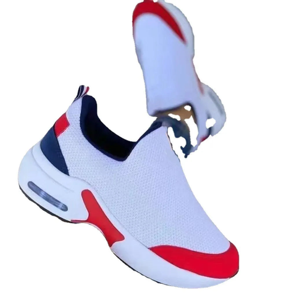 Women's knit sneakers with round toe, flat heel and rubber sole, shown in black, red, white and navy blue.