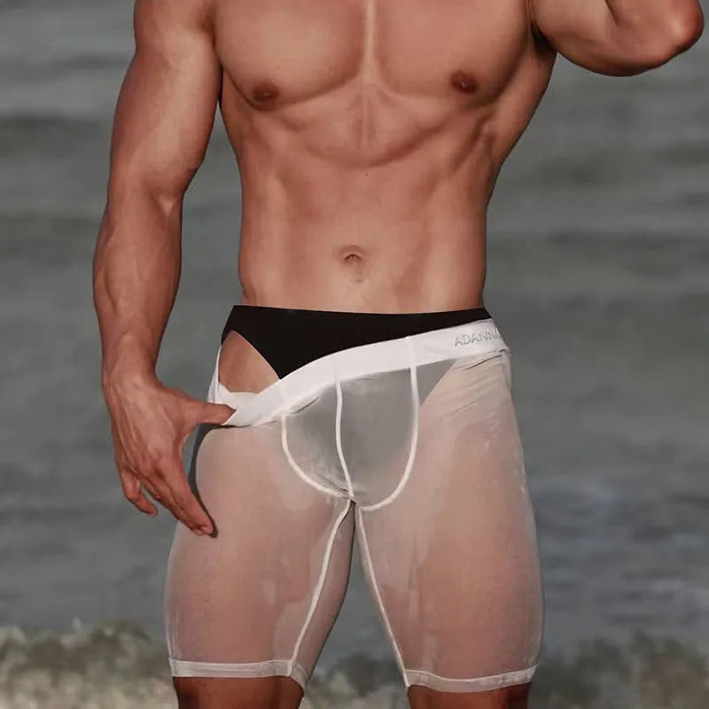 Men's black mesh home shorts with seamless design and hip-lifting function, made from knitted nylon fabric