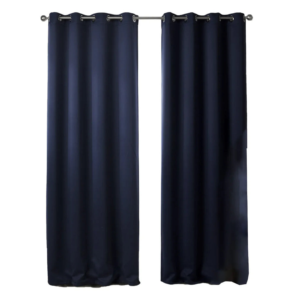 Navy blue blackout curtains with shading cloth fabric in vertical design, showing printed surface and perforated top for hanging