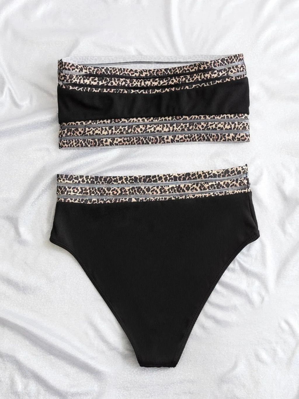 Black strapless swimsuit with leopard print pattern, briefs-style bottoms