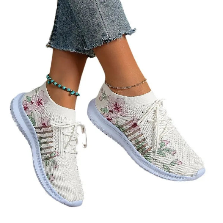 Women's Milky White mesh flyknit running shoes with rubber sole and flat heel design