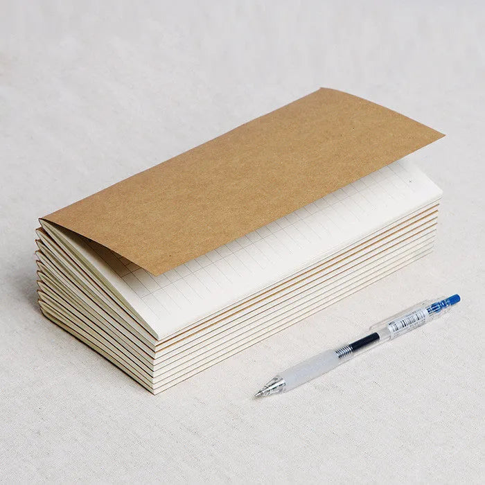 Cowhide diary refill inner core showing 11x21cm size and saddle stitch binding