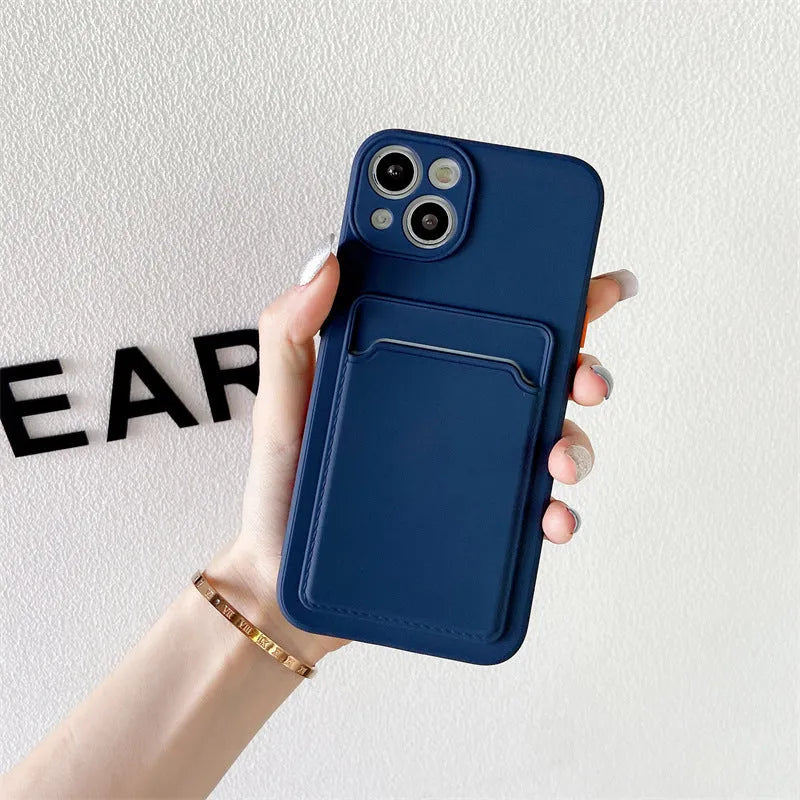 Sky blue silicone iPhone case with a card slot on the back, shown on a mobile phone.