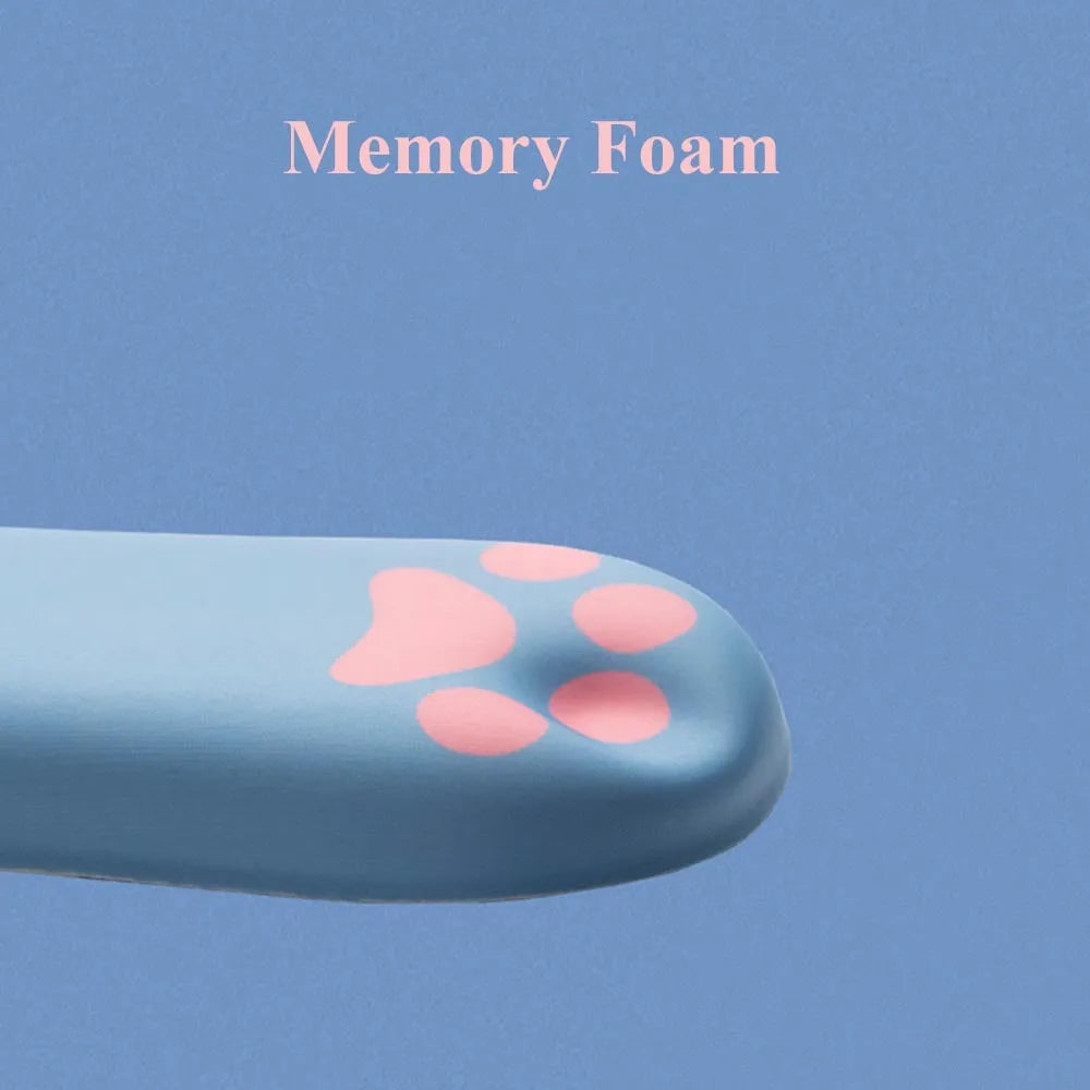 Cat's claw cartoon design memory foam keyboard wrist rest pad in blue, showing its length and thickness on a desk.