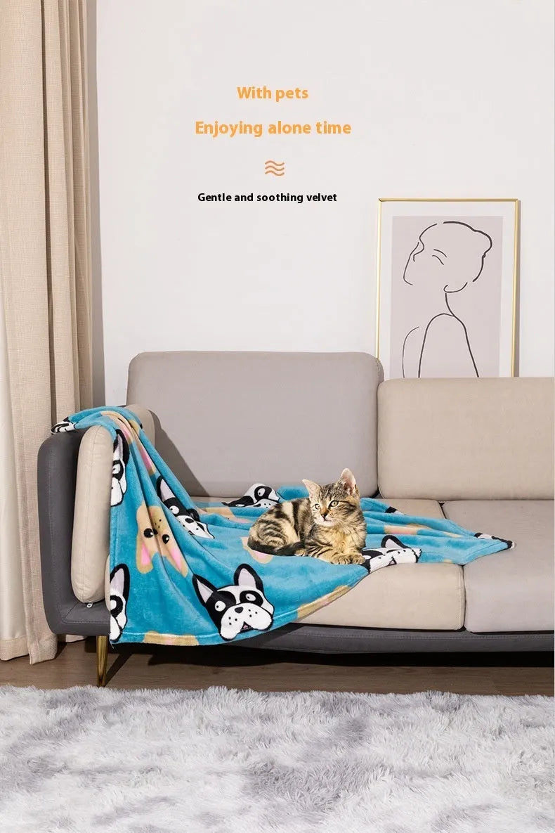 Double-sided dog blanket with cartoon patterns in blue dog, khaki paw, and blue paw designs on polyester flannel
