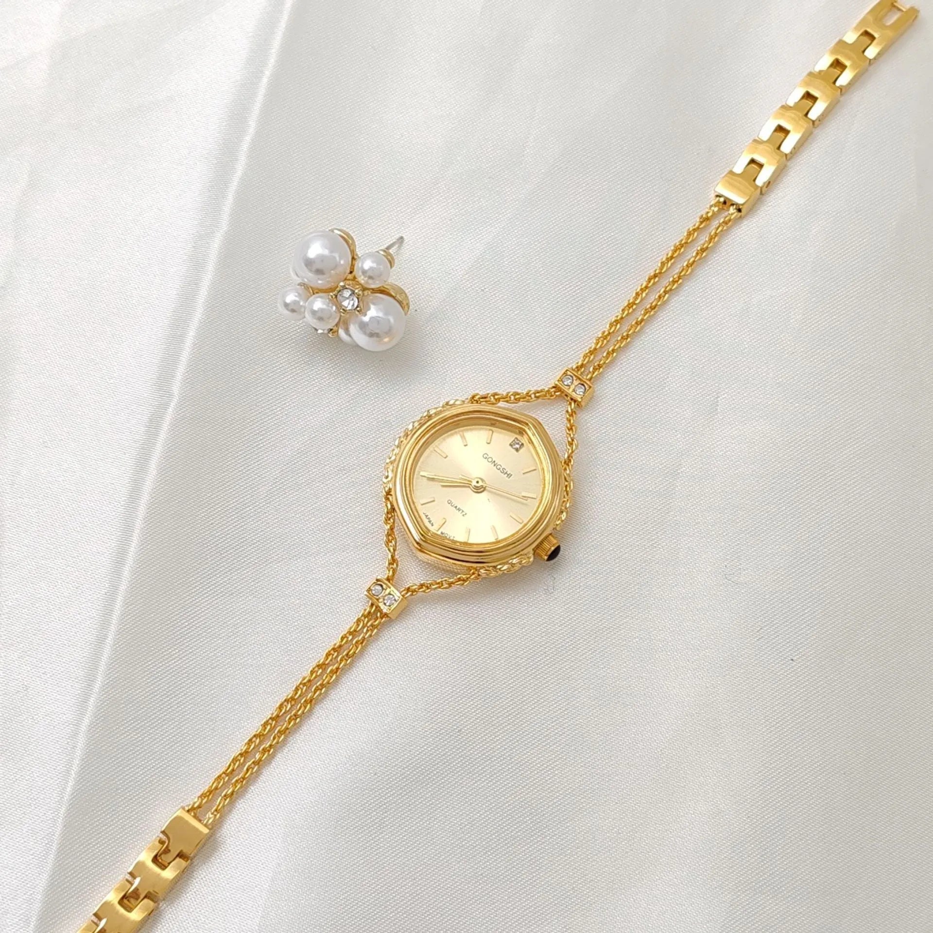 Gold or silver mori style women's quartz watch with 25mm dial and chain strap