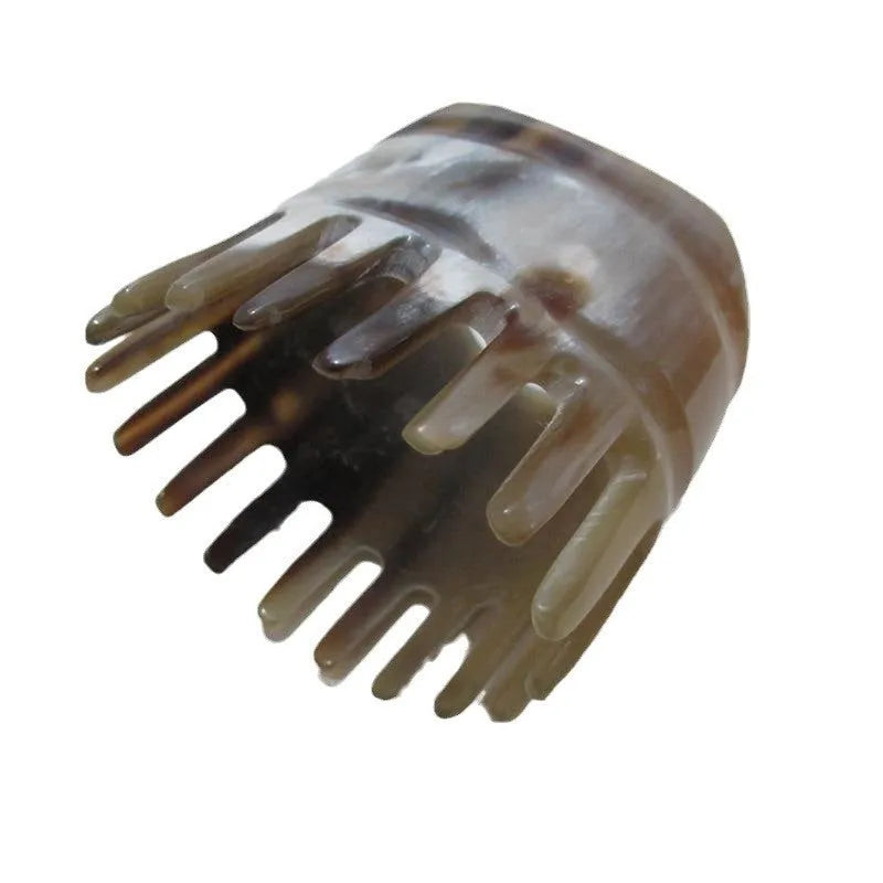 White buffalo horn comb with wide teeth and pointed tip for detangling and scalp massage, 18cm length.