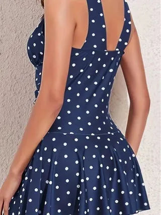 Women's blue polka dot plus size bikini with skirted briefs and matching top