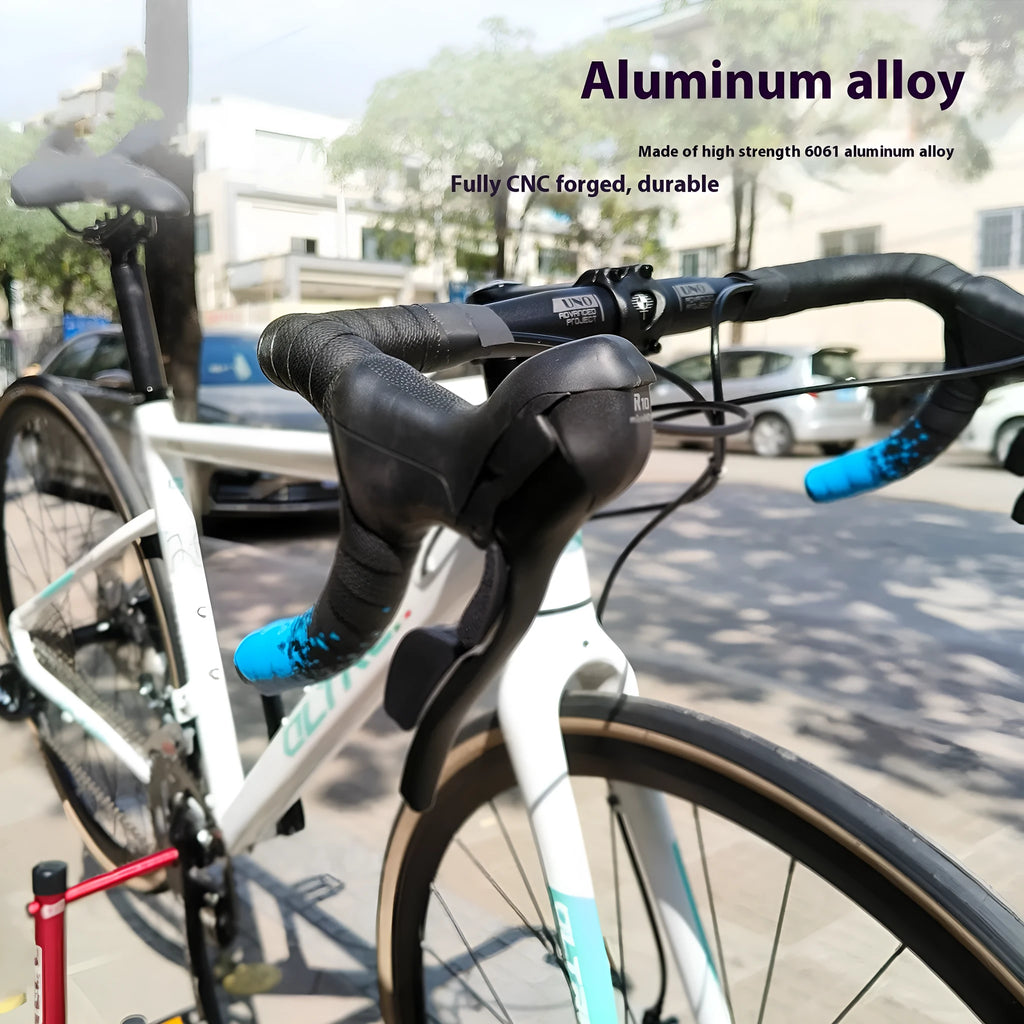Black aluminium road bike drop handlebar with small bent shape and UNO printing marks