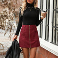 High waist stitching zipper short skirt for women in black, camel, brick red, or dark green polyester fabric, hip skirt design with short length
