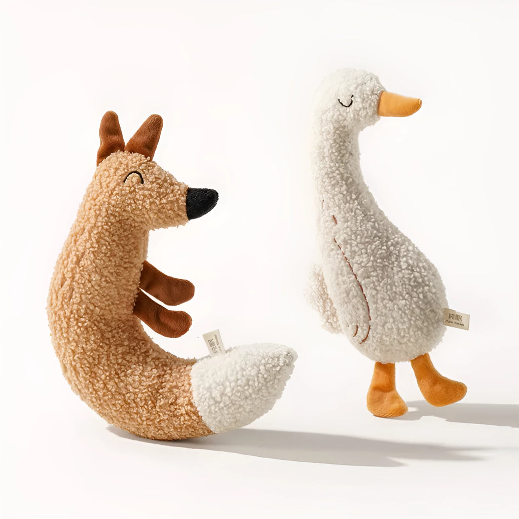 Cartoon dog grinding toy in fox or duckling design with sound paper core