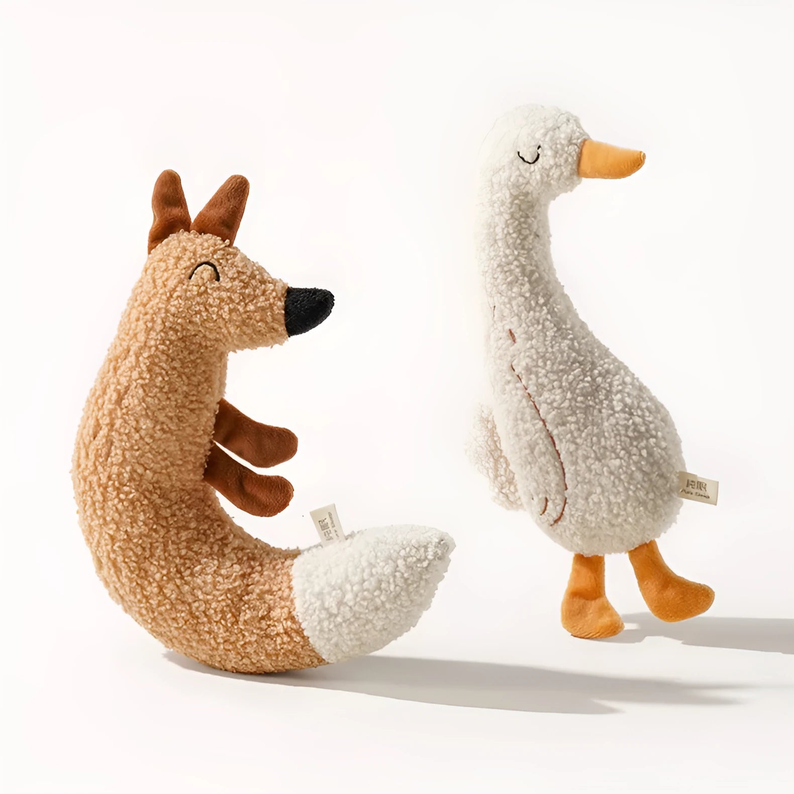 Cartoon dog grinding toy in fox or duckling design with sound paper core
