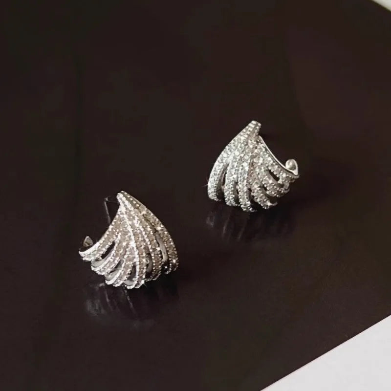 Geometric line design earrings with platinum finish and zircon material for women