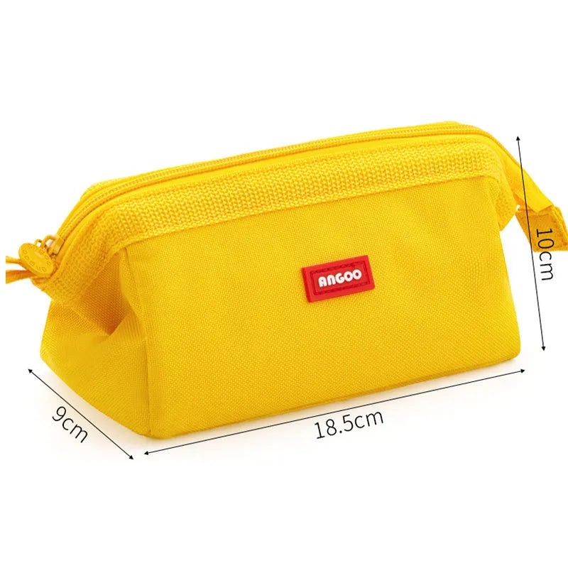 Large canvas pencil case with double zipper in yellow, black, or dark blue colour.