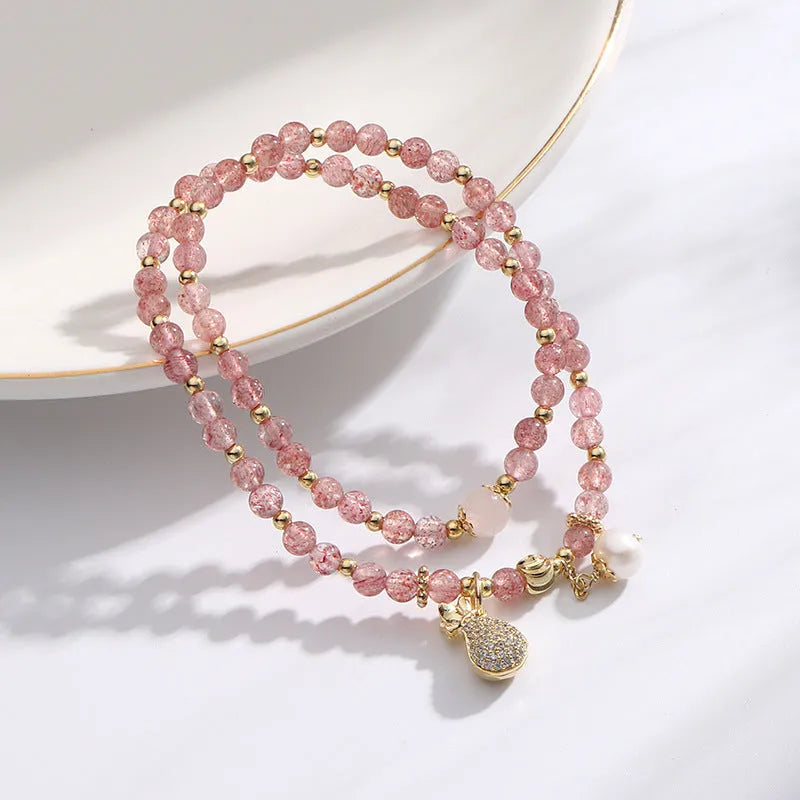 Strawberry quartz geometric crystal bracelet for women with wallet-style design