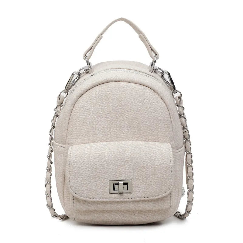Korean style solid colour PU casual backpack with three-dimensional pocket, shown in black, beige, blue, dark blue or khaki.