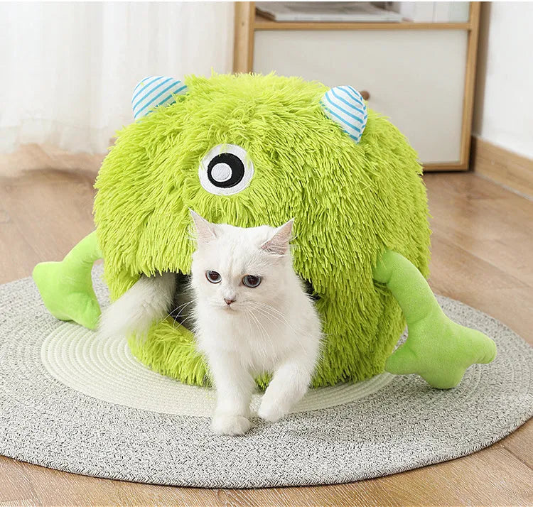 Round fluffy plush cat bed with non-slip base in three sizes for indoor pets