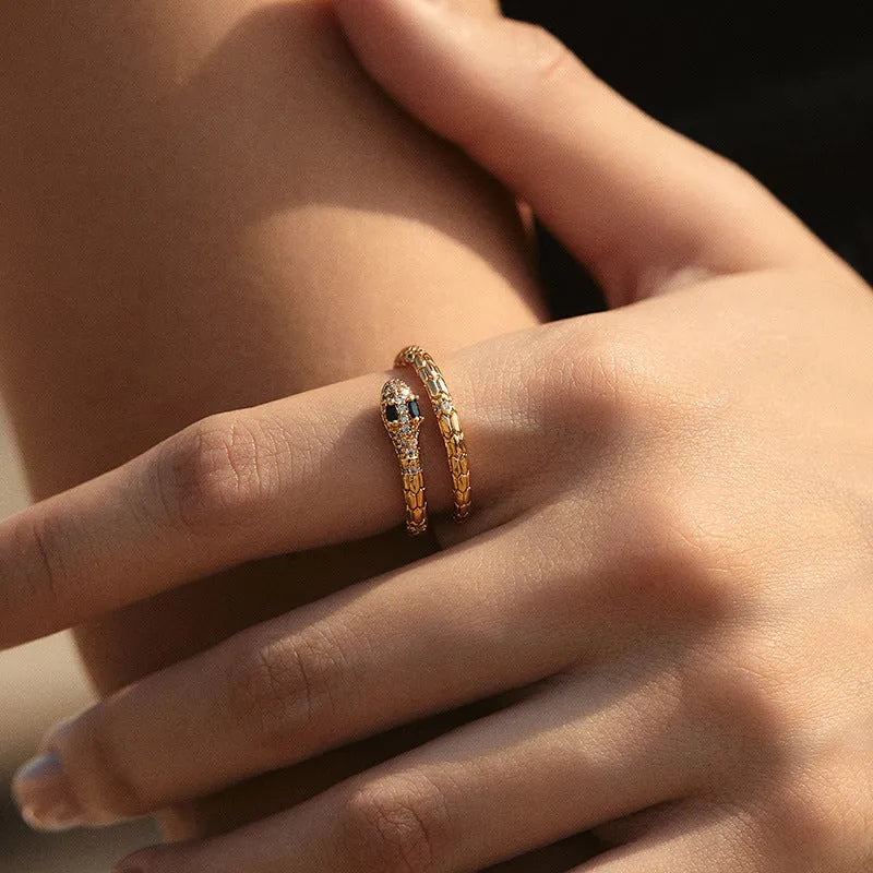 Gold coloured snake ring with open mouth design and adjustable opening