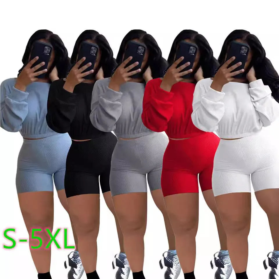 Women's solid colour off-the-shoulder long sleeve top and shorts two-piece set.