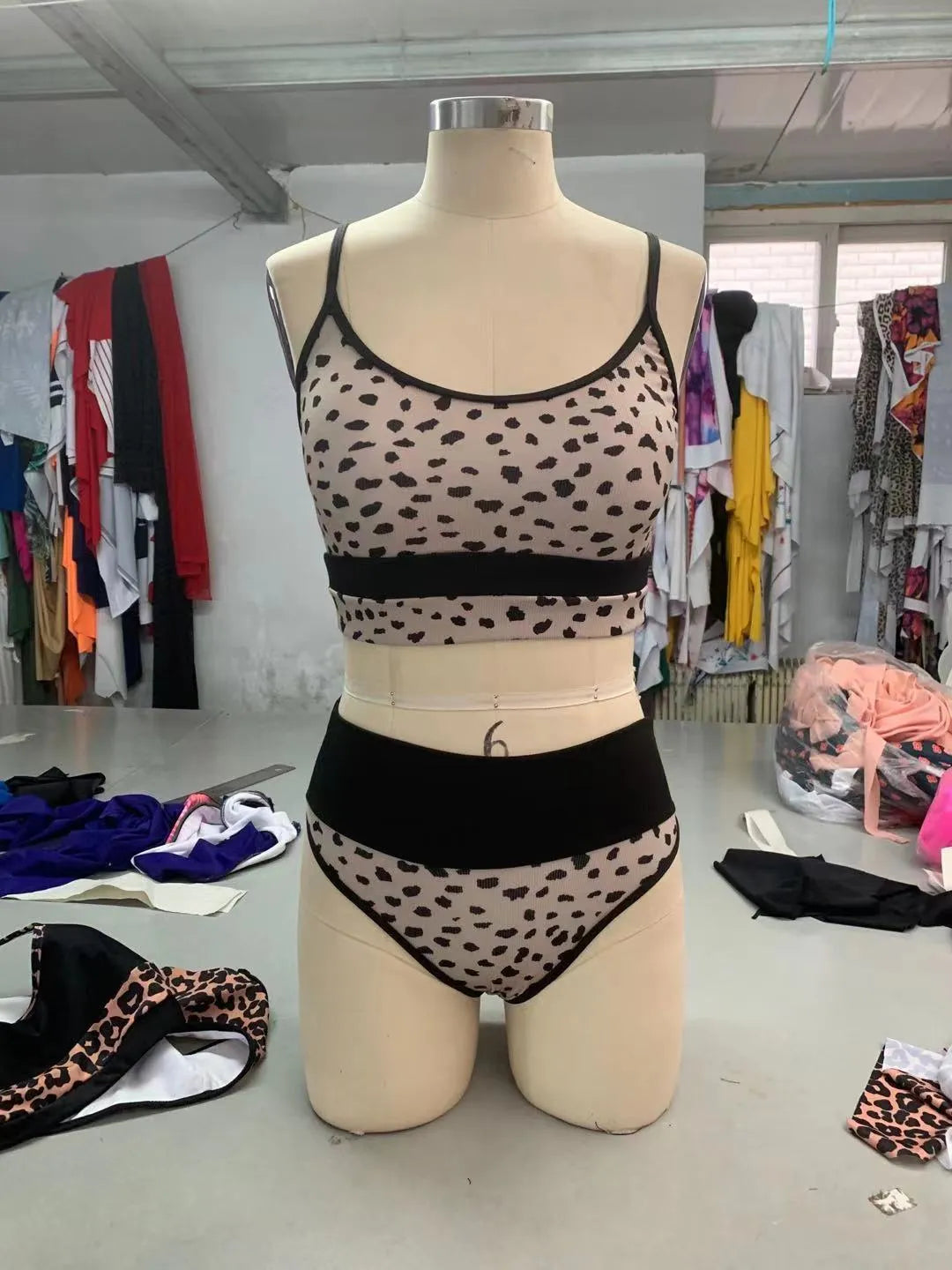 Women's high waist split bikini swimsuit in leopard print and white options showing front and back views
