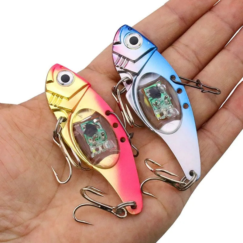 Metal Vib electronic fishing lure with luminous body in blue and red colour options