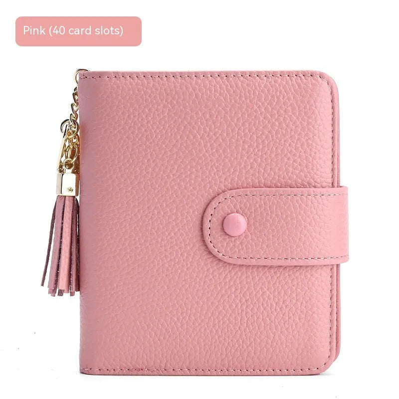 Large capacity genuine cowhide leather card holder wallet with tassel, snap closure, 40 card slots, and ID holder