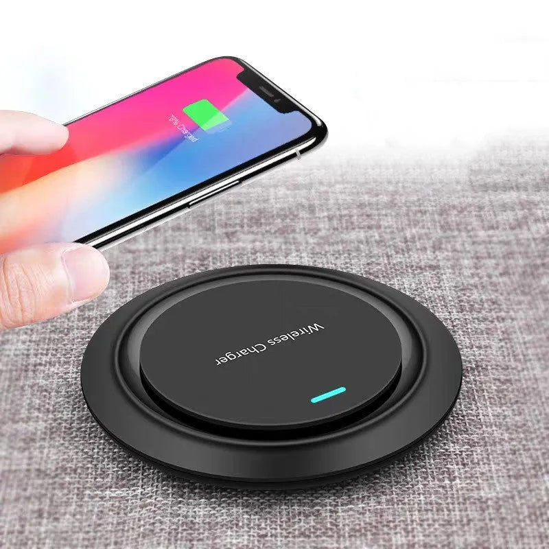 Round desktop wireless charger for mobile phones in black or white colour
