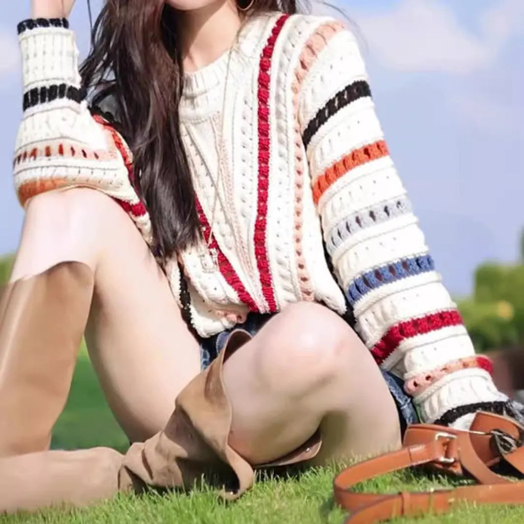 Rainbow striped pullover sweater with batwing sleeves and hollow knit texture