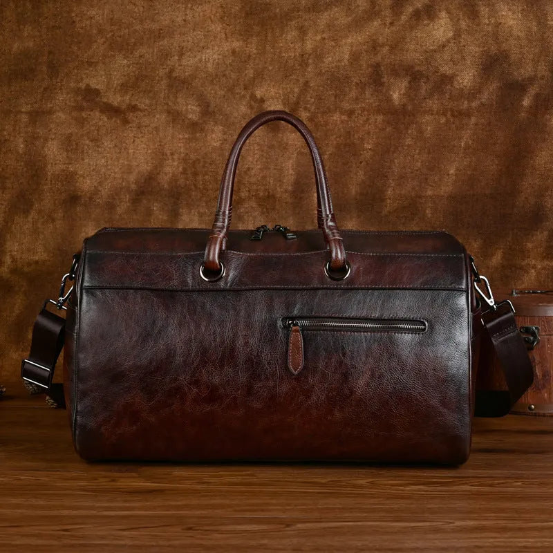 Brown retro style leather handbag made from first layer cowhide with large capacity.