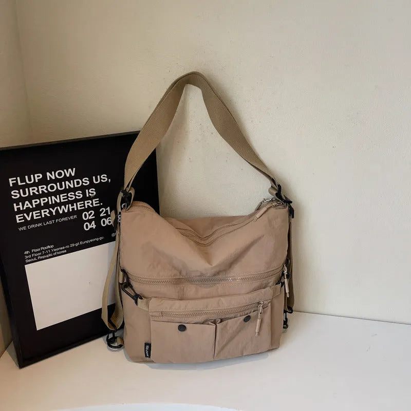 Women's soft nylon crossbody bag with sandwich zipper pocket and adjustable shoulder straps