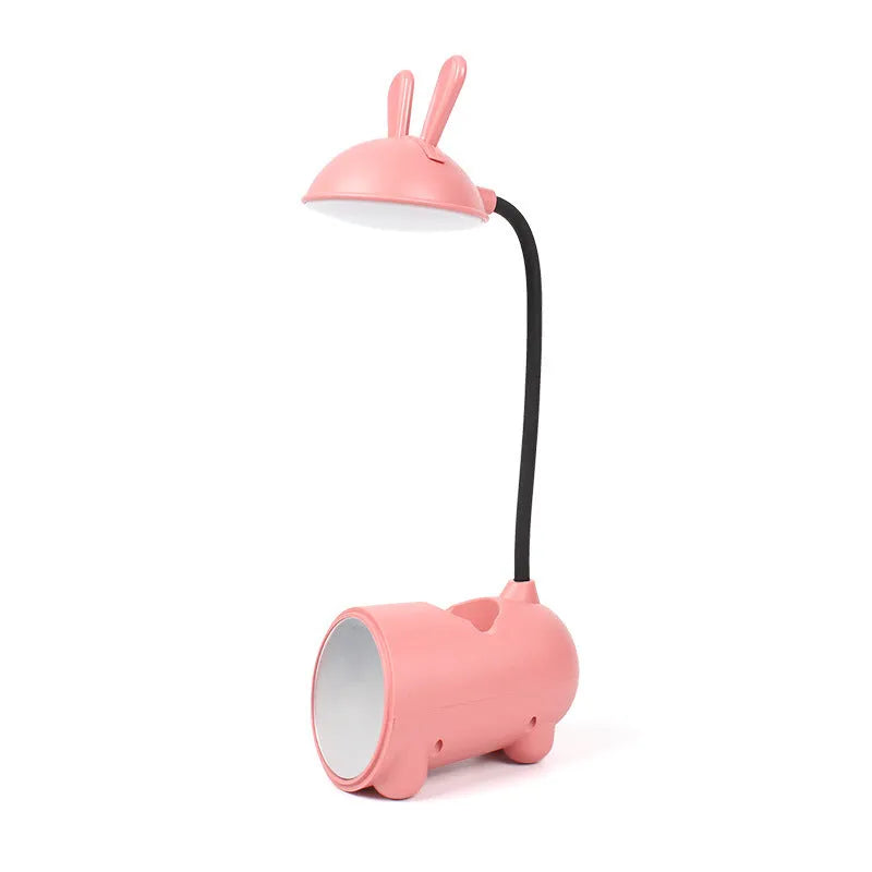 Green cartoon desktop lamp with pen container, USB cable, and modern simple design on wooden desk