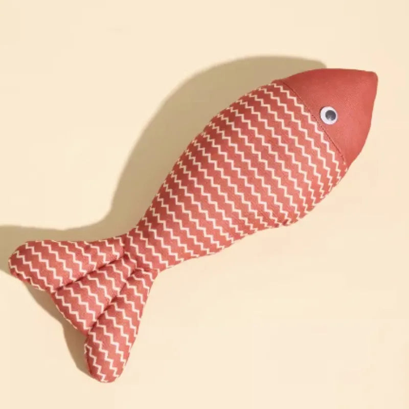 Blue and yellow fish-shaped cat toys in large and medium sizes on a plain background.