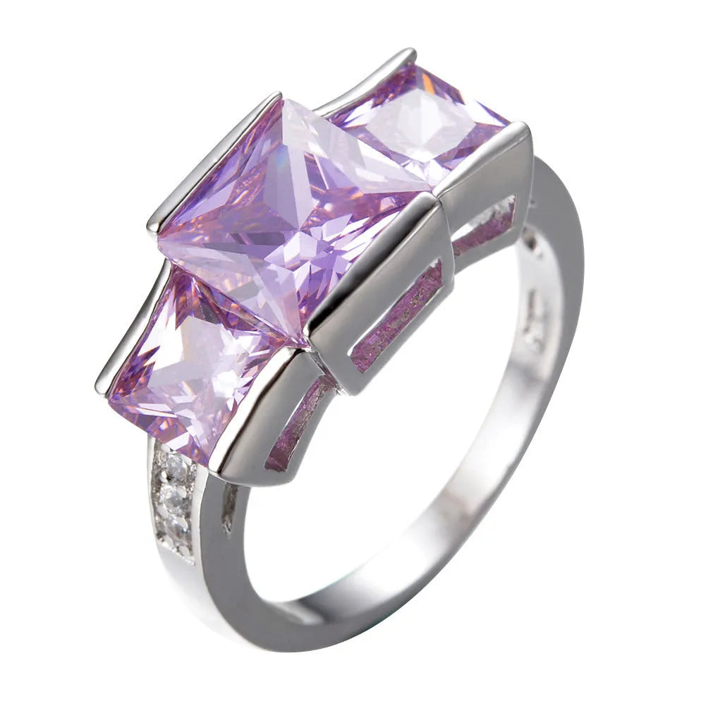 Copper women's ring with geometric design and electroplated colour finish, showing rainbow metal elements