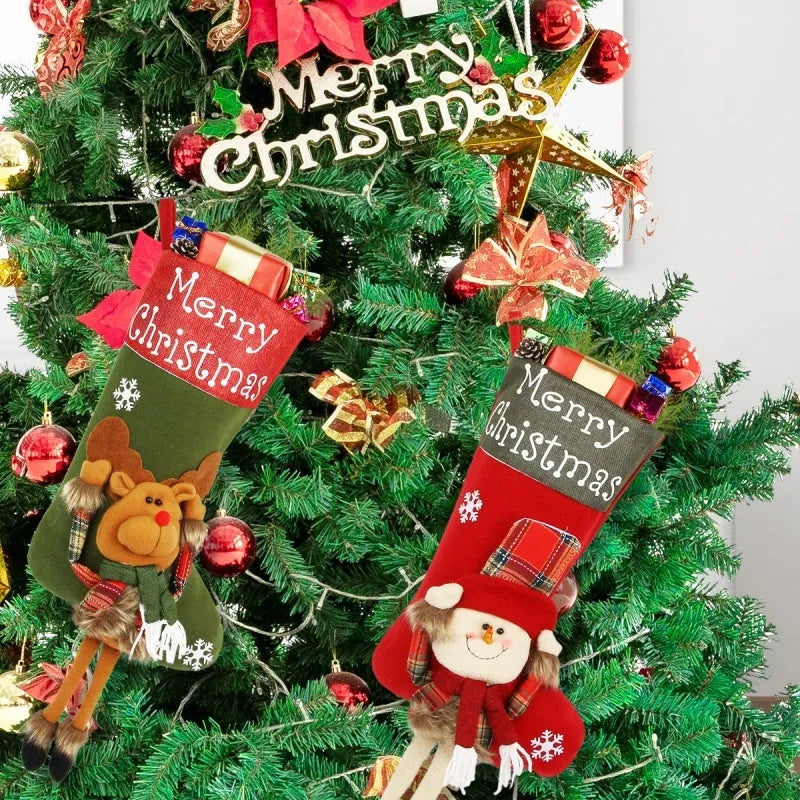 Three large Christmas stockings with Santa, Snowman, and Reindeer 3D applique designs in non-woven fabric