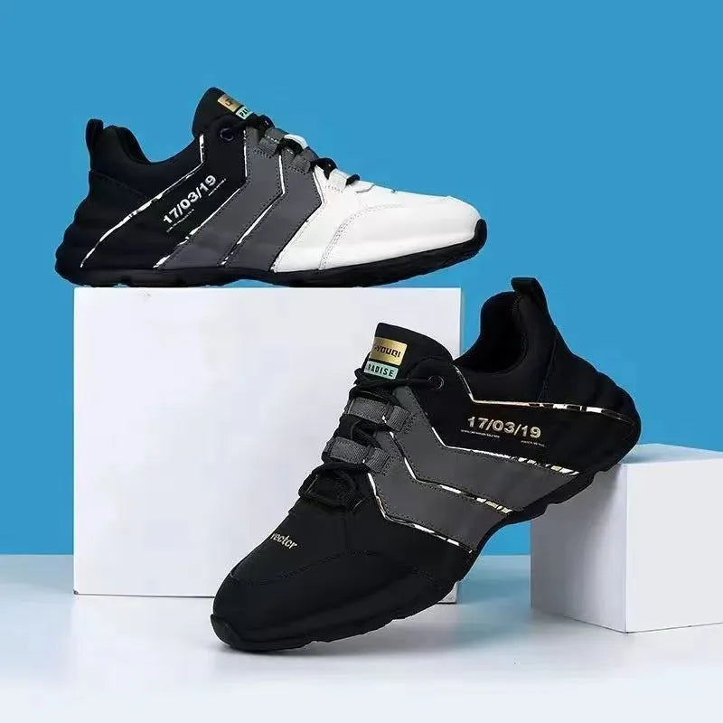 Casual low-top sneakers with round toe, front lace-up, and thick injection-moulded soles in black and grey colour option