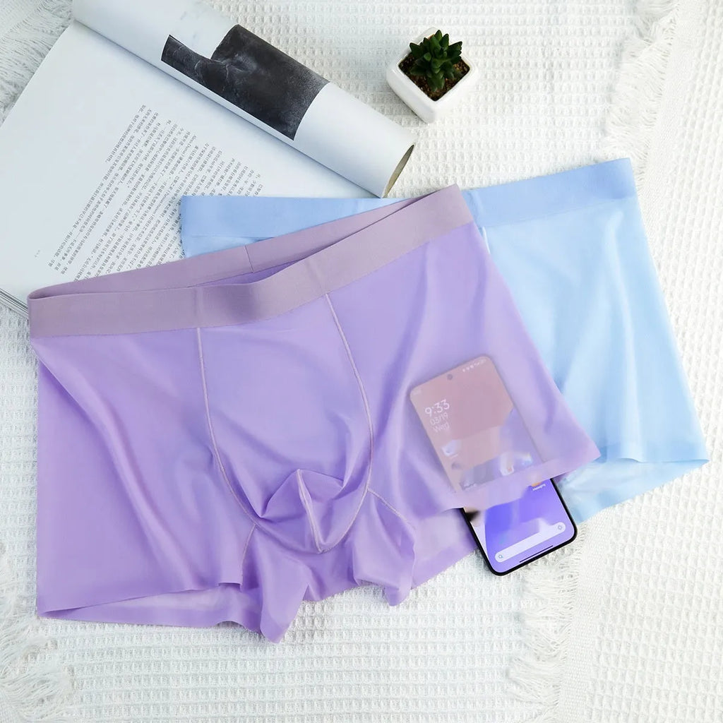 Ultra-thin Ice Silk seamless boxer briefs in white, shown flat.