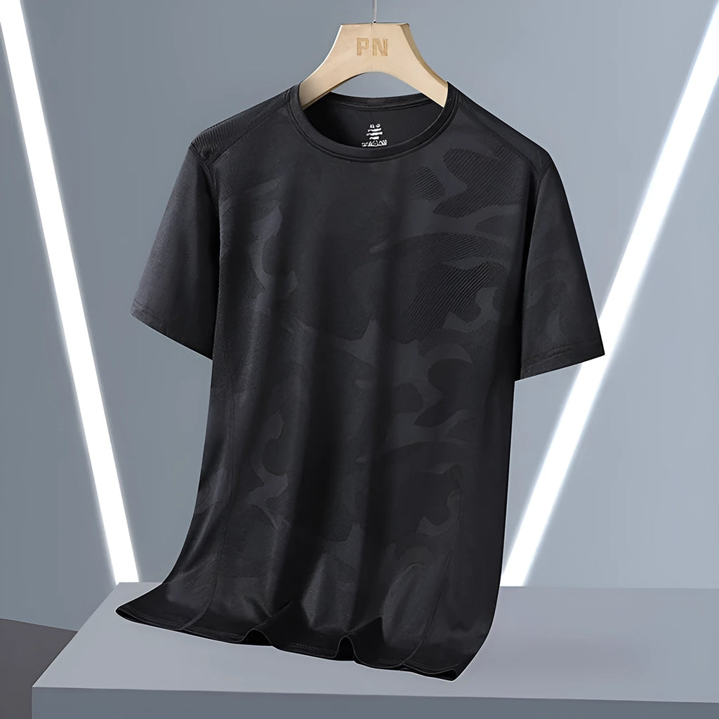 Men's loose fit camouflage short sleeve summer top in quick-drying nylon fabric.