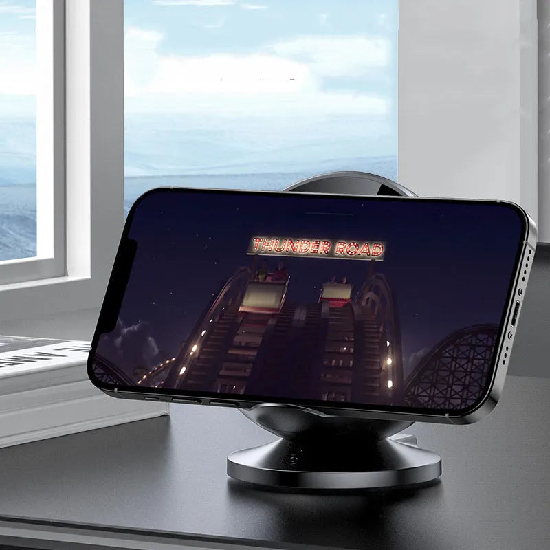 Multifunctional mobile phone wireless charger holder with Bluetooth speaker in black, showing charging surface and USB port