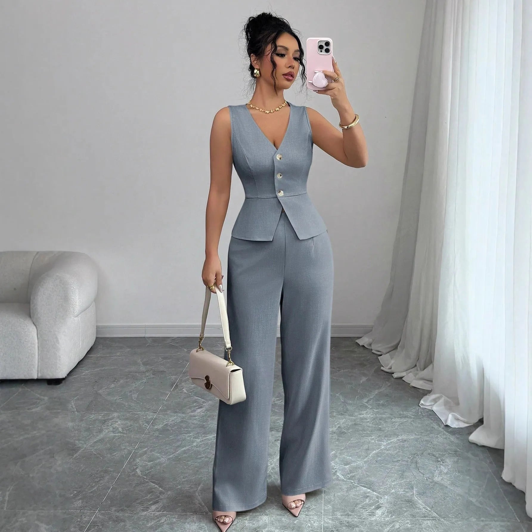 Women's solid colour sleeveless vest and high-waist trousers two-piece set in polyester fabric