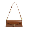 Milky white cowhide leather women's crossbody bag showing clamshell opening and pillow shape.