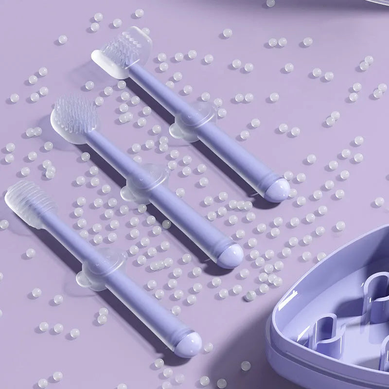Purple soft silicone toothbrush for cleaning cat and dog teeth on a white background.