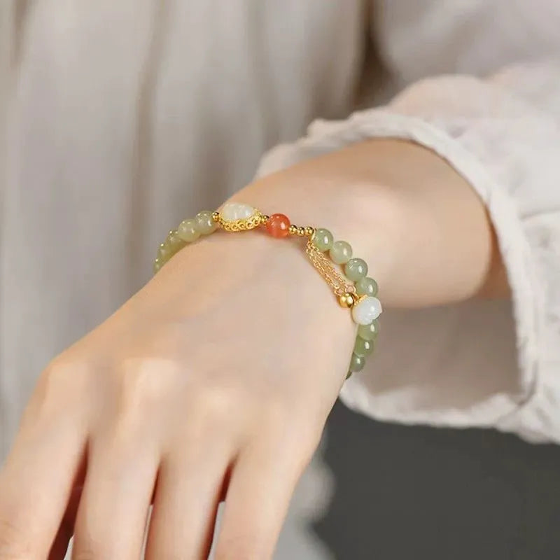 Qingshui jade women's bracelet with fu character and gold gourd motif, 6mm gold plated beads