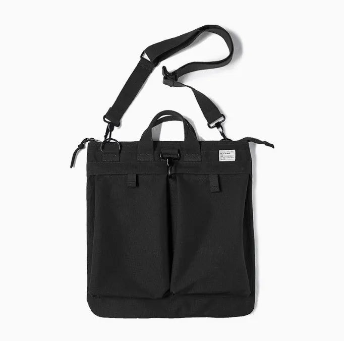 Marden Tooling Helmet Canvas Crossbody Bag in charcoal black showing vertical square shape and shoulder strap