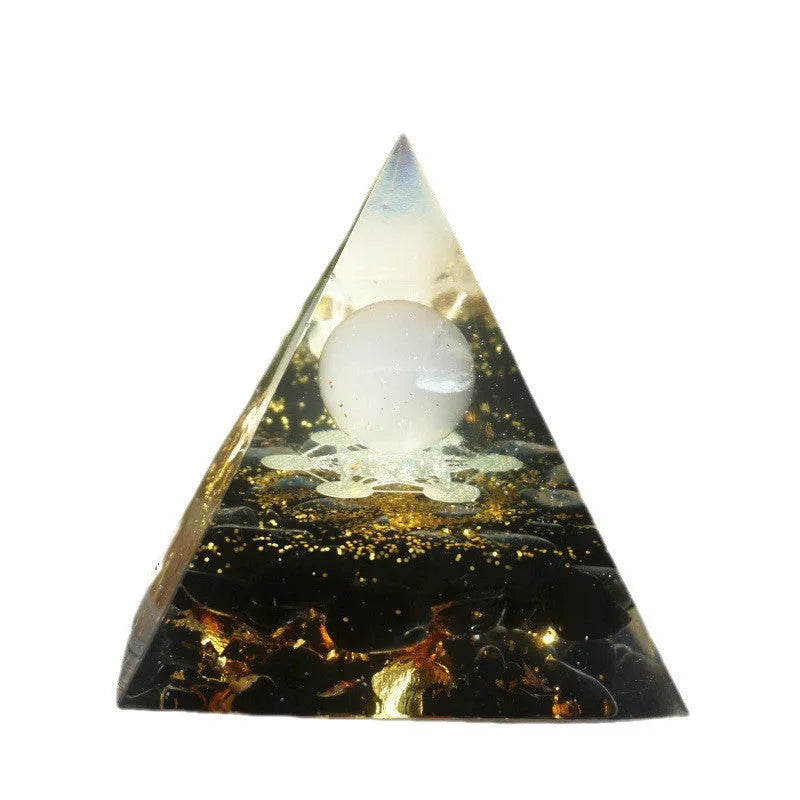 6cm crystal epoxy pyramid decoration with natural gravel visible through transparent resin in Lapis lazuli blue colour