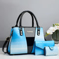 Three-piece ladies' PU leather shoulder bag set with crocodile stitching in beige colour.