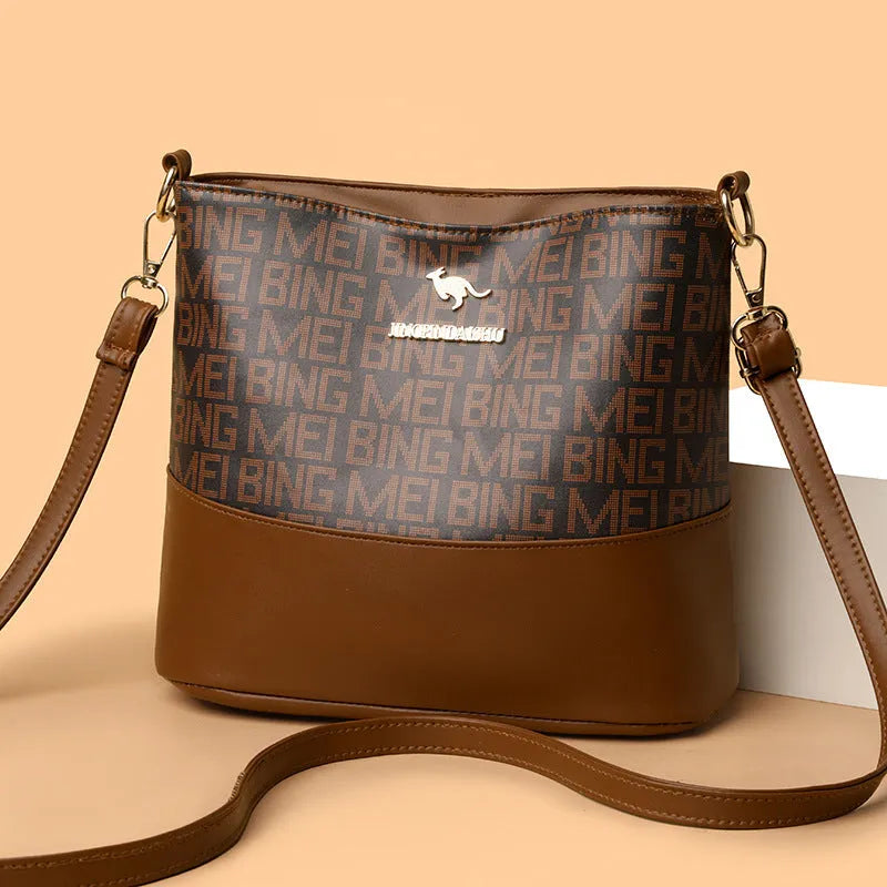 Brown retro style soft leather messenger bag with multiple compartments and sewing thread detailing