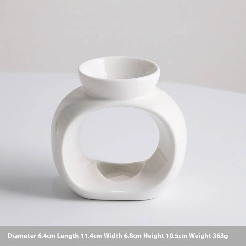 White ceramic aromatherapy stove ornament with Nordic design and anti-dry burning safety feature