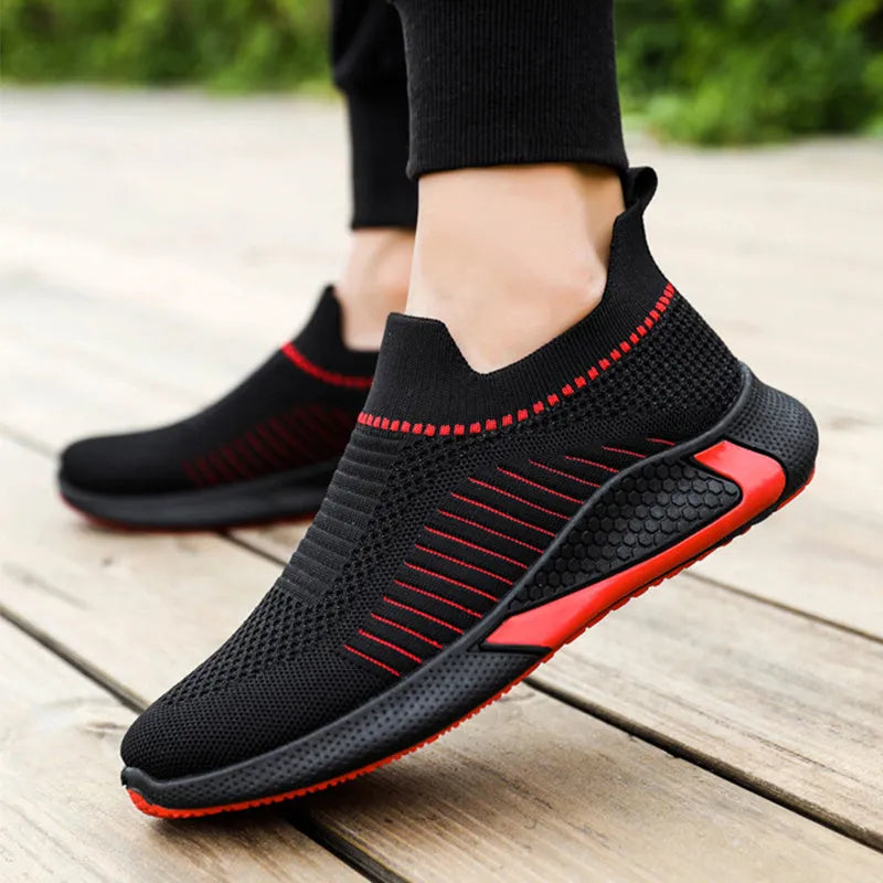 Men's mesh sock shoes with striped design, Flyknit upper, and plastic sole in black-white colour, size 42